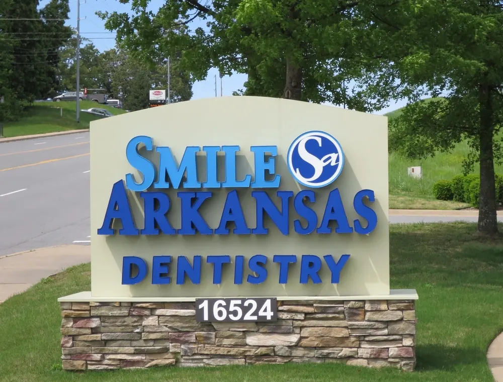 The Smile Arkansas Dentistry monument sign at 16524 Chenal Parkway.